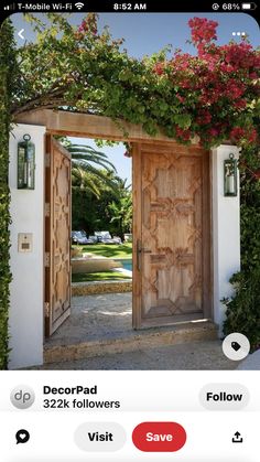 an open door with flowers growing over it and the words decor pad below that reads, do visit