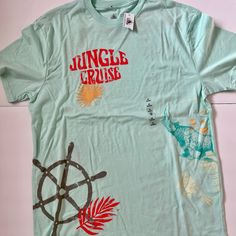 Sea Green Disney Jungle Cruise T-Shirt Size Medium. Brand New With Tags Themed Cartoon Print Crew Neck T-shirt, Disney Summer Cartoon Print T-shirt, Disney Character Print Summer T-shirt, Disney Character Print Cotton T-shirt, Themed Short Sleeve Tops For Disney Trips, Disney Crew Neck T-shirt For Summer, Disney Pre-shrunk Short Sleeve T-shirt, Disney Short Sleeve Pre-shrunk T-shirt, Disney Green Crew Neck T-shirt