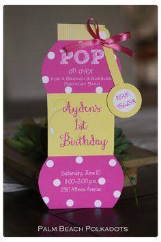 a pink and yellow top birthday card with polka dots on it, sitting on a table