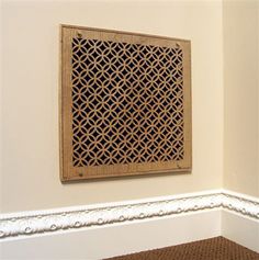 a decorative wooden panel on the wall in a room