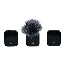 three different cell phones with a fur ball on the front and back covers in black