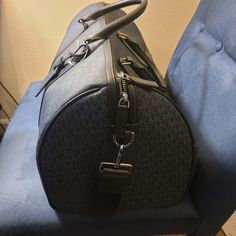 Brand New W/O Tags!!!Michael Kors Weekender Bag-Unisex Admiral Blue Also Have Matching Large Tote Bag!!! Logo-Print Canvas 89.4% Coated Canvas/9.6% Polyester/1% Polyurethane Gunmetal Hardware 20.75"W X 11.25"H X 10.375"D Handle Drop: 5.25" Adjustable Strap: 11"-26" Interior Details: Zip Pocket, 2 Slip Pockets Lining: 100% Polyester Zip Fastening Chat !7 Dust Bag Not Included Imported Style # 37holhru3b Admiral Blue, Bag Logo, Gunmetal Hardware, Large Tote Bag, Large Tote, Weekender Bag, Duffel Bag, Interior Details, Logo Print