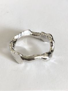 This is what I would call,  one of a kind ring, because each band  is unique and different from the other, maybe similar but never the same, they are around 5 grams,  solid bands in sterling silver, comfortable and easy to wear. We are offering many sizes including quarter of sizes. Silver Clay Rings, Silver Clay Ring, Silver Chunky Rings, Abstract Rings, Wax Carved Ring, Handmade Silver Rings, Silver Jewlery, Diy Ring, Edgy Jewelry