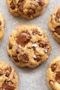 chocolate chip cookies on a baking sheet ready to be eaten