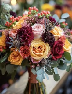 a bouquet of flowers sitting on top of a table