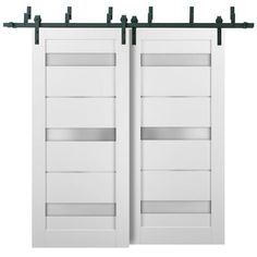 two white doors with metal bars on each side