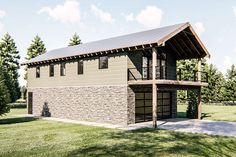 a two story house with a metal roof on the grass and trees in the background