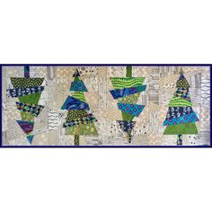 a quilted wall hanging with many different designs on it's sides and blue trim around the edges