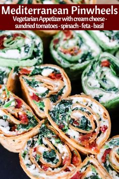 spinach pinwheels are stacked on top of each other