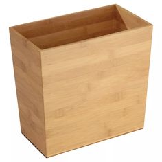 a square wooden container is shown on a white background