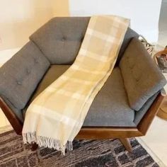 a chair with a blanket on top of it