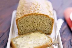 a loaf of bread sitting on top of a white plate