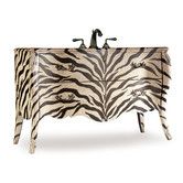 a zebra print dresser with a sink and faucet