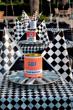 a table topped with black and white checkered tables