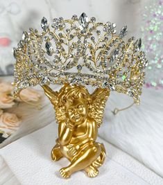 FAST & FREE SHIPPING This stunning handmade gold crown is fit for a princess on her wedding day. The intricate design and sparkling rhinestones make it a perfect accessory for any bride looking to make a statement. The crown is made in the United States and features a beautiful combination of gold and rhinestones. This crown is also a great accessory for any formal occasion or for a little girl's dress-up collection. The gold color and regal design make it a versatile piece that can be worn for many different events. SHOP MORE STYLES: https://www.ebay.com/str/happydreamgifts Princess Style Gold Crown With Structured Shape, Elegant Luxury Gold Crown, Gold Princess Crown With Structured Shape, Gold Regal Crown With Pinched Shape, Regal Gold Crown With Structured Shape, Bridal Crown Tiara, Tiara Gold, Pageant Crowns, Girls Crown