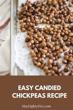 chickpeas on a baking sheet with text overlay that reads easy candied chick peas recipe