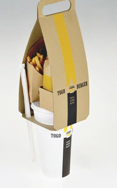 This New Fast Food Packaging System Makes Eating Junk Easier--But Also Less Wasteful Fries Packaging Ideas, Bakery Names, Clever Packaging, Packaging System, Sandwich Bar, Design Café, Innovative Packaging