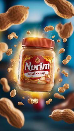 a jar of nut butter surrounded by nuts flying in the air and falling into it