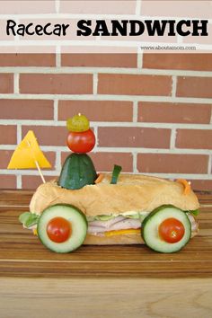 a sandwich made to look like a car with vegetables on the top and in the middle