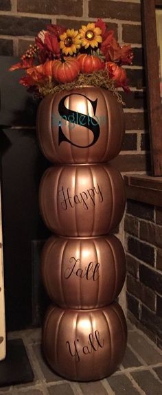 a stack of pumpkins with the words happy new year written on them