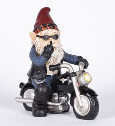 Hi-Line Exclusive - Middle Finger Biker Gnome HI-LINE GIFT LTD. Biker Gnomes, German Market, Wishing Wells, Fairy Garden Ornaments, Gardening Accessories, Gnome Pictures, Garden Gnomes Statue, Outdoor Garden Statues, Chess Boards