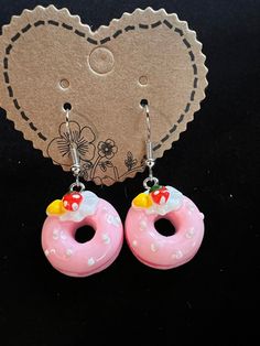 These fun and cute dangling earrings are perfect for women or little girls. The hook is hypoallergenic stainless steel. The donut is plastic. Magical Stuff, Pink Donut, Pink Donuts, Le Crochet, Dangling Earrings, Jewelry Earrings Dangle, Springs, Etsy Earrings, Dangle Drop Earrings