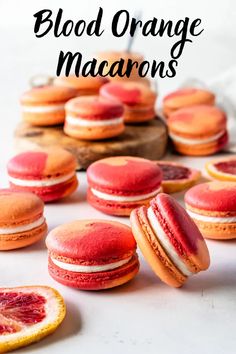 blood orange macarons with blood oranges in the background