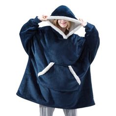 The amazingly comfortable Hoodie combines the warmth of a cozy blanket with the comfort of your favorite hoodie. This hoodie is the most comfortable oversized hooded sweatshirt that keeps you snug & warm from head to toe. Features reversible design, large hood & roomy front pocket. The lining is made of super-soft wool for warmth and comfort. The hooded blanket with sleeves is perfect for home, office, dorms, parties, camping & more. Suitable for men and women. even for kids. Color: Blue | Alwyn Sweatshirt Blanket, Pull Oversize, Oversized Blanket, Winter Plaid, Womens Sweatshirts Hoods, Winter Blankets, Winter Pullover, Hoodie Blanket, Oversize Women