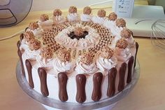 a cake sitting on top of a wooden table