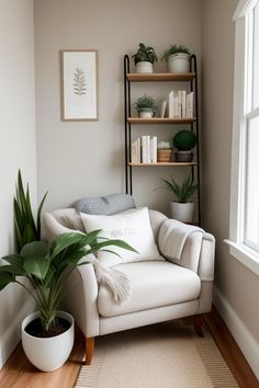 a living room with a white couch and potted plants on the shelf next to it