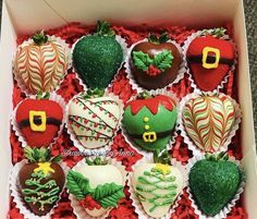 a box filled with assorted decorated chocolates