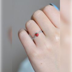 Introducing our Adjustable Strawberry Ring, a delightful accessory perfect for any occasion. Crafted with high-quality materials, this ring features a charming strawberry design and is adjustable to fit most finger sizes. Ideal as a unique gift for her, this ring adds a touch of whimsy to any outfit. Product Details: Materials: High-quality alloy, enamel Size: Adjustable to fit most finger sizes Design: Cute strawberry motif, ideal for everyday wear or special occasions Care Instructions: Avoid Strawberry Ring, Strawberry Design, Cute Ring, Cute Strawberry, Knuckle Rings, Ring Sale, Men Earrings, Women Ring, Cute Rings