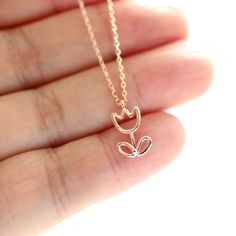 Beautiful and lovely rose gold Tulip charm necklace. Made of a dainty rose gold wired Tulip charm with a skinny rose gold plated brass chain. Soft and simple. Great for gift, everyday or special occasions.  Your item will ship in a gift box. Please feel free to contact me if you have any questions. ♥ Length  14" - 20" chain ♥ Tulip charm  1/4" x 3/8"  ♥ Rose gold plated over brass  ♥  See more Rudiana Accessories  Rudiana.etsy.com Cute Rose Gold Flower Jewelry, Cute Rose Gold Jewelry With Flower Charm, Dainty Rose Gold Necklace For Birthday, Rose Gold Flower Charm Necklace With Delicate Chain, Cute Rose Gold Charm Necklaces For Valentine's Day, Rose Gold Flower Pendant Charm Necklace For Valentine's Day, Valentine's Day Rose Gold Charm Necklace With Delicate Chain, Cute Rose Gold Valentine's Day Charm Necklaces, Dainty Rose Gold Necklace For Mom