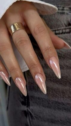 Elevate your nail game with a stunning blend of sophistication and modern flair. This almond-shaped glossy nude and chrome nail design offers a perfect balance of elegance and edge, making it ideal for any occasion. The sleek chrome accents add a touch of futuristic charm, while the glossy nude base keeps things timeless and chic. Whether you're heading to a formal event or just want to add a bit of glam to your everyday look, this nail inspiration is sure to turn heads and leave a lasting impression. Nail Minimalist Design, Neutral Cute Nails, Blush Nails Acrylic, Influencer Nails, Almond Nails Chrome, Nude Nail Colors, Feminine Nails, Classic Nail Designs