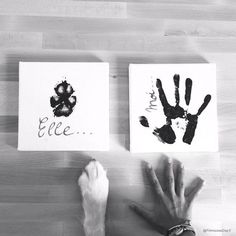 two children's hand prints on paper with the words i love you