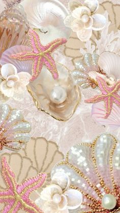 shells and starfishs are arranged on a pink background with gold trim around them