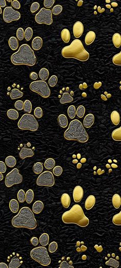 a black background with gold dog paw prints