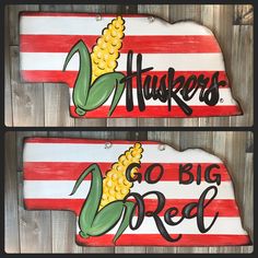 two wooden signs with corn on the cob and words that say, go big red