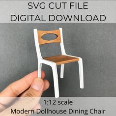 This listing is for a digital download of an SVG file; no physical product will be shipped.  You can use the SVG file with Cricut, laser cutter, or other cutting machines, to cut the materials needed to make your own dollhouse miniature piece.  This SVG file is for a modern 1:12 scale dollhouse dining chair.  The design works with 1/16" (1.5mm) or 1/8" (3mm) material.  SVG elements include: - Chair sides - Chair seat - Chair back (5 options) You will receive: - SVG file. - PDF file with a link to download the SVG file (if unable to download directly from Etsy), and a link for the detailed tutorial/material list. - PDF pattern/template that you can print, for reference. To preview the instructions, visit https://www.dillydallydollhouse.com/modern-dollhouse-dining-chair/ Check out my other l Pink Dollhouse, Dollhouse Nursery, Dollhouse Chair, Dollhouse Rug, Art Deco Chair, Deco Chairs, Miniature Chair, Barbie Doll House, 1 12 Scale Dollhouse