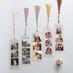 four hanging tags with photos and tassels attached to the sides of each tag