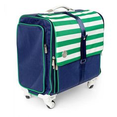 a blue and green striped suitcase on wheels