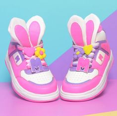 Hopping in our newest and cutest Hop Hop Hi Tops Shoes! With 3D bunny ears and heart and flowers playful charms attached, these shoes are a statement of pure happiness. Perfect for anyone who believes that life is too short for ordinary shoes, our Hop Hop Hi Tops are your ticket to a fun-filled journey with every wear! 🌸 🌈 ✨ 3d Bunny, Pastel Shoes, Heart And Flowers, Unicorn Shoes, Bunny Shoes, Elle Fashion, Unique Socks, Pretty Shoes Sneakers, Kawaii Shoes