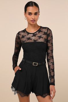 A date night spent in the Lulus Sheer-ly Sweet Black Sheer Lace Crew Neck Long Sleeve Bodysuit is bound to be a total treat! Sheer floral lace shapes this flirty bodysuit with a crew neckline and sheer dÃ©colletage that flows into long fitted sleeves. The figure-hugging bodice finishes at attached thong bottoms with snap closures. Fit: This garment fits true to size. Length: Size medium measures 29.50" from shoulder to hem. Bust: Great for any cup size. Waist: Fitted - stretchy fabric allows cus Long Sleeve Lace Bodysuit For Party, Feminine Fitted Bodysuit With Lace Closure, Elegant Long Sleeve Lace Bodysuit, Feminine Sheer Lace Top For Night Out, Chic Lace Top Bodysuit For Party, Chic Lace Bodysuit For Parties, Sheer Lace Top For Night Out, Lace Bodysuit For Evening, Spring Lace Bodysuit For Night Out