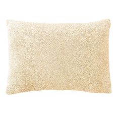 a white pillow with small speckles on the front and back of it's cover