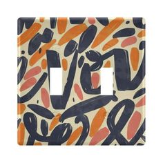 a light switch cover with an abstract design