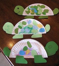 three paper plates with turtle designs on them