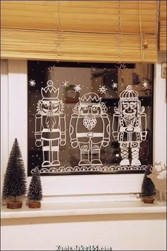 an image of christmas decorations on the window sill