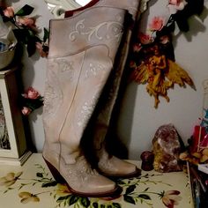 New And Rare Dan Post Over The Knee Cowboy Boots. New With Tags But No Box A Very Fairytale Over The Knee Bridal Cowboy Boots. With White On White Embroidery. These Boots Are Gorgeous And To Die For. Perfect For An Amazing Event For A Cowboy Wedding. With A 3 1/2 Inch Heel. Hundred Percent Leather. #Cowgirl #Fairycore #Bride #Westernbride # Bohemian #Bohemianbride Over The Knee Cowboy Boots, Bridal Cowboy Boots, White On White Embroidery, Knee High Western Boots, Tall Brown Leather Boots, Marni Sandals, Dan Post Boots, Cowboy Wedding, Dan Post