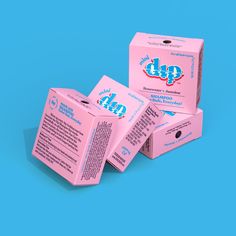 three pink boxes are stacked on top of each other with the word dip printed on them