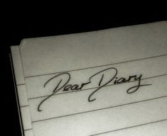 two sheets of paper with the words dear diary written on them in cursive writing